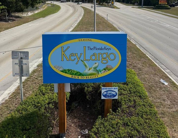 Leaving the Florida Keys, Key Largo, Back to Reality sign beside US-1