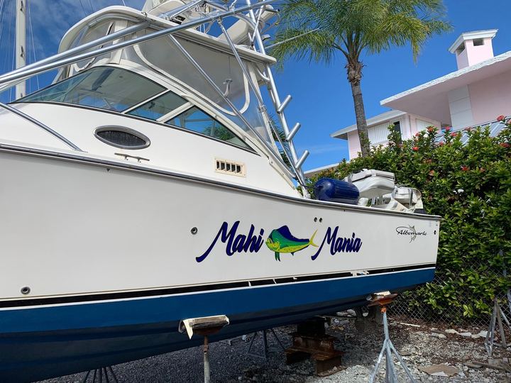 Mahi Mania script boat name on a sportfisher