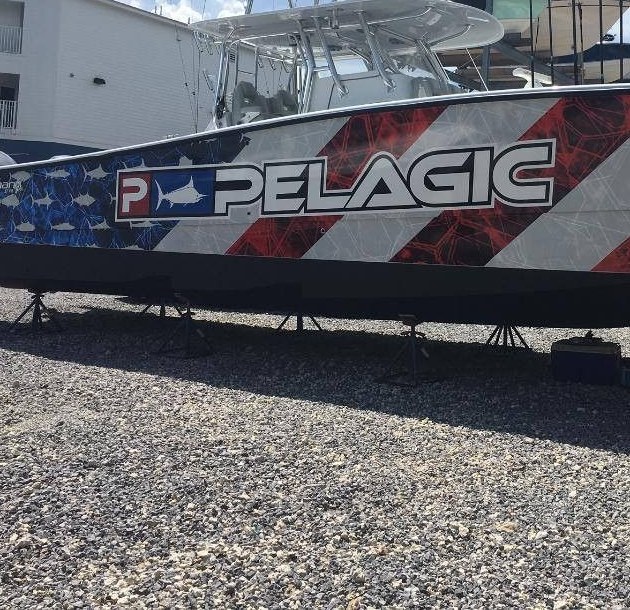 Pelagic center console on stands with a red, white and blue stars and stripes wrap