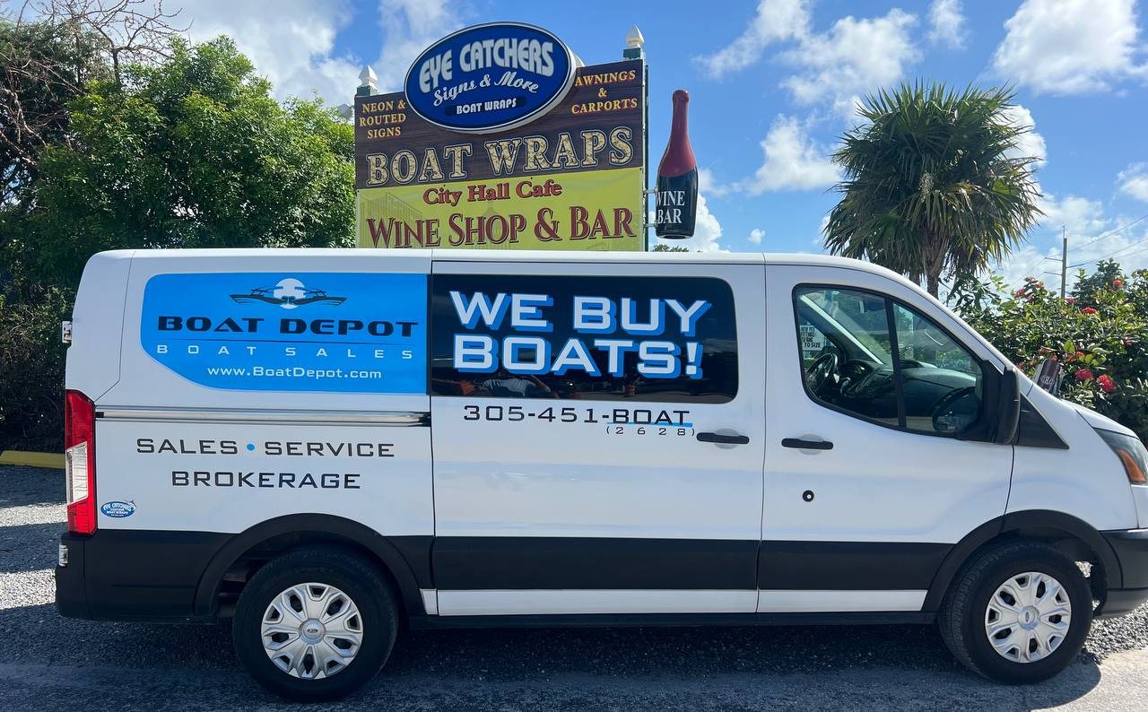 White van wrapped for Boat Depot with We Buy Boats on the side