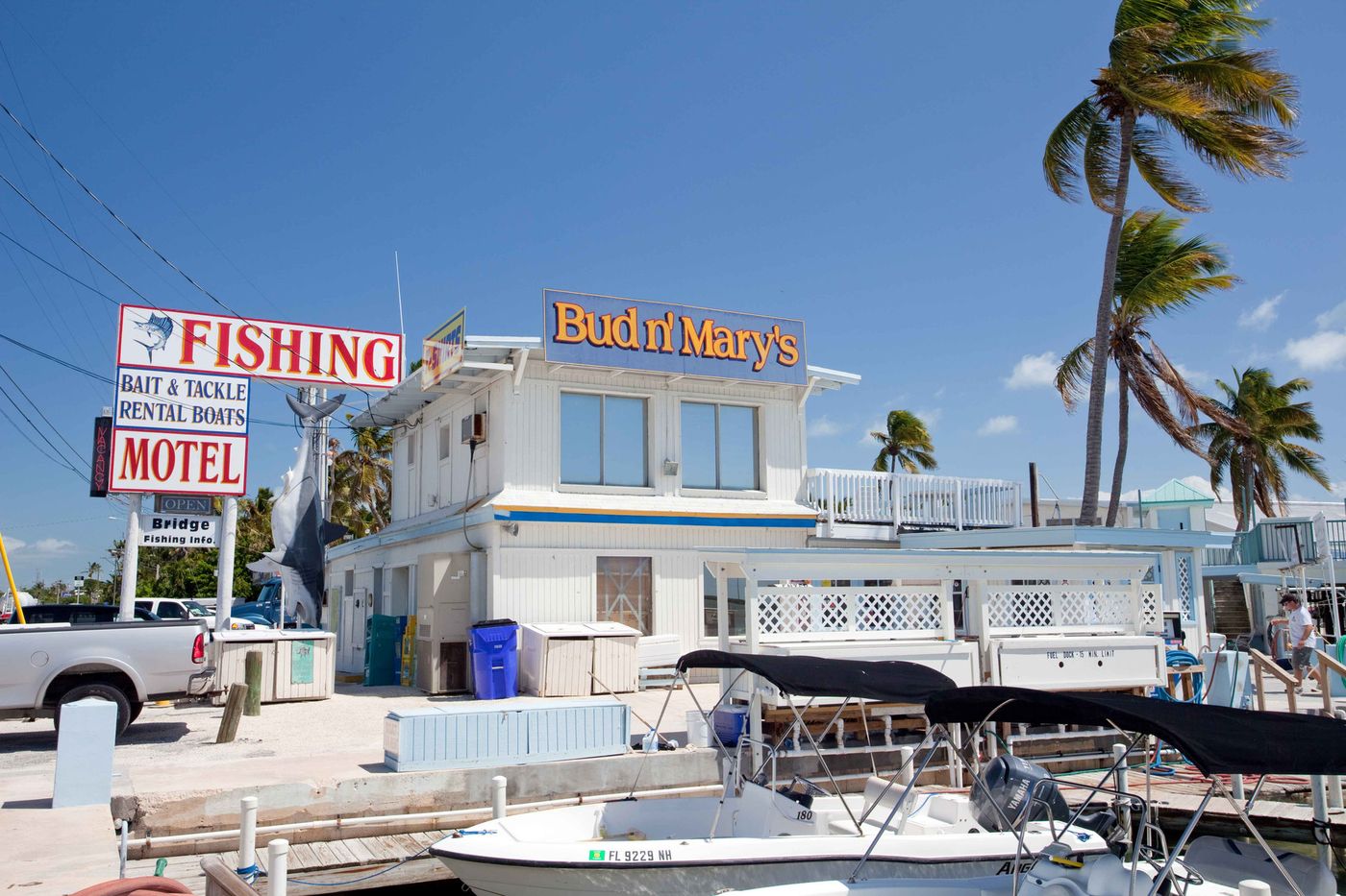 Fishing charter and motel signs at Bud N' Mary's Marina