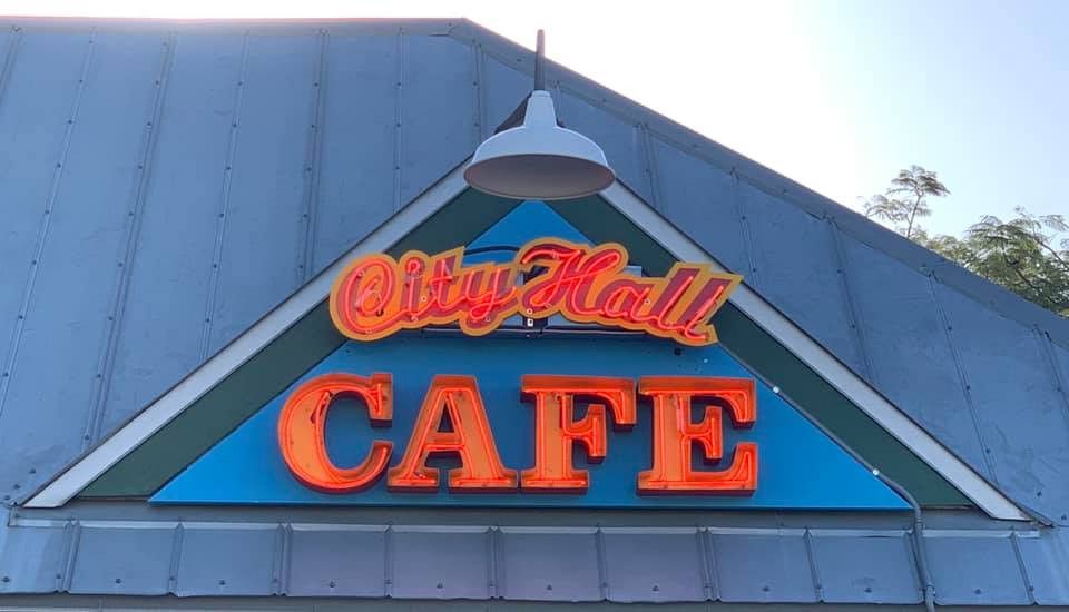 Lit City Hall Cafe sign in Tavernier