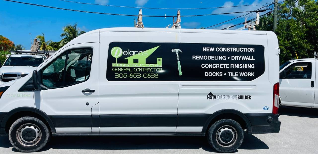 White contractor van with logo and services lettering