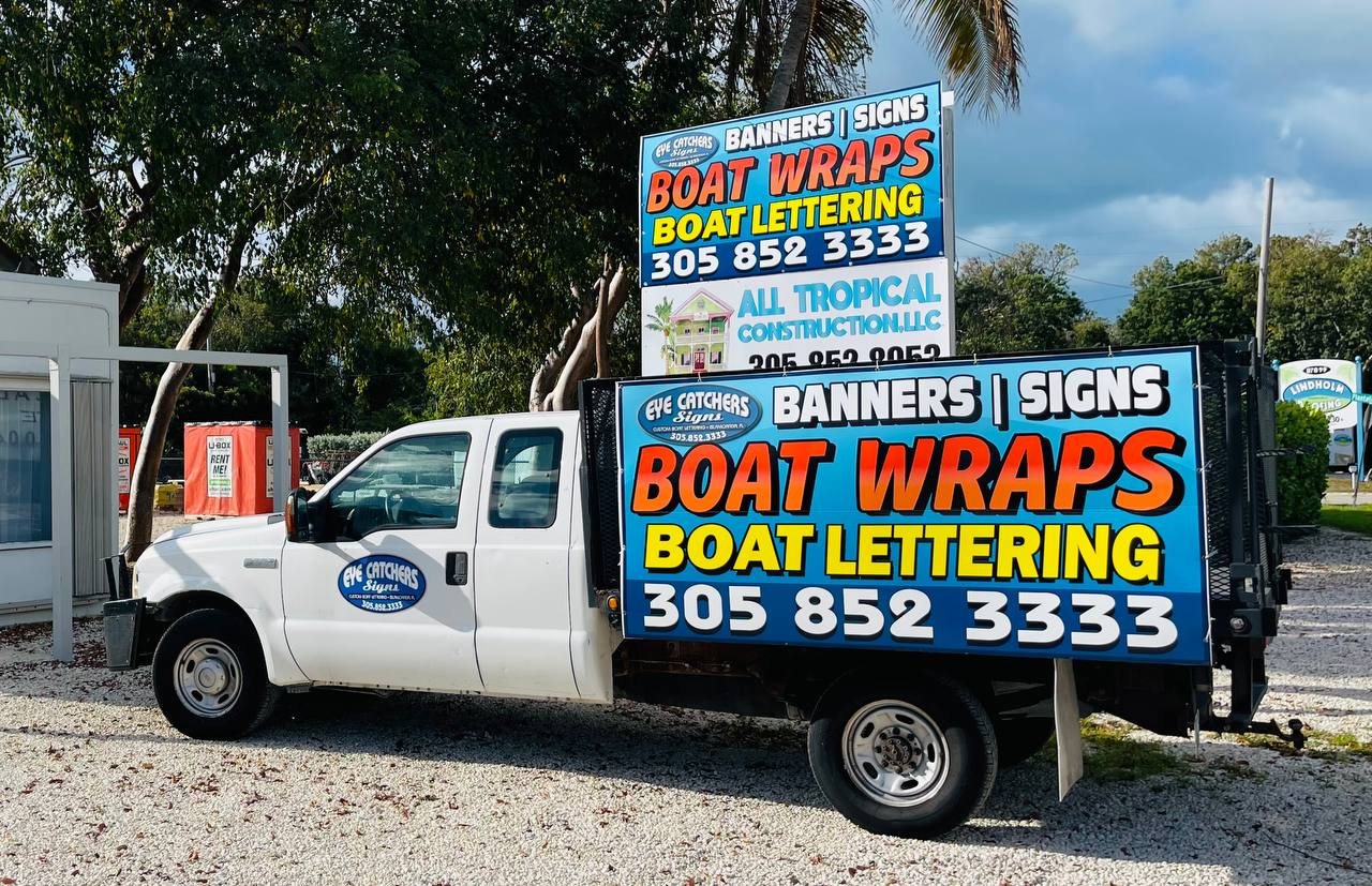 Our truck carrying banners for boat wraps, lettering and signs
