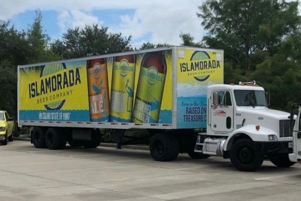 Box truck wrapped with Islamorada Beer Company cans and logos