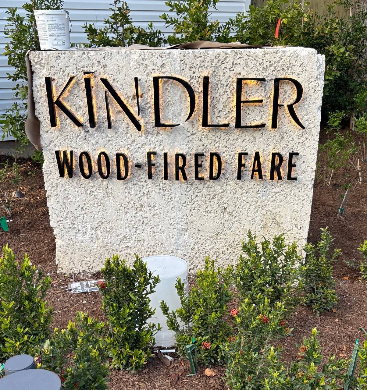 Kindler Wood-Fired Fare stone monument sign with raised lettering