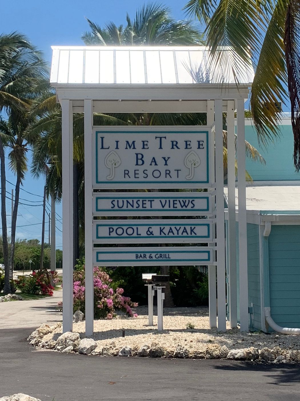Lime Tree Bay Resort pole sign with amenity panels
