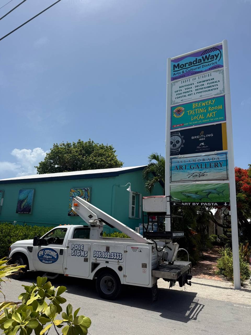 Morada Way Arts and Cultural District pole sign with tenant panels