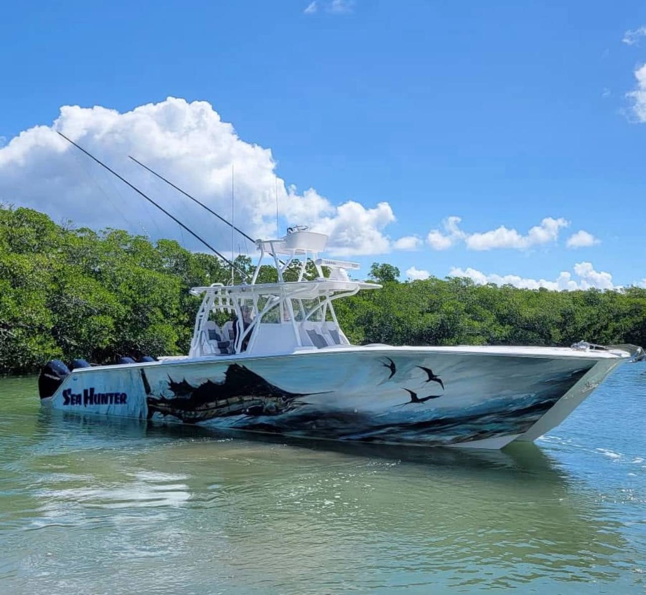 Sea Hunter center console wrapped with a marlin and frigatebirds in gray and blue